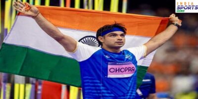 Neeraj Chopra with the Indian flag