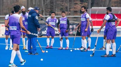 Coach Explaning to the players before the Match