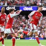Arsenal players celebrate during their 2-0 victory over Chelsea in the Premier League.