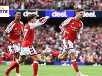 Arsenal players celebrate during their 2-0 victory over Chelsea in the Premier League.