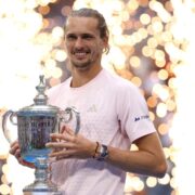 Alexander Zverev holds the 2026 US Open trophy after winning the men’s singles final.