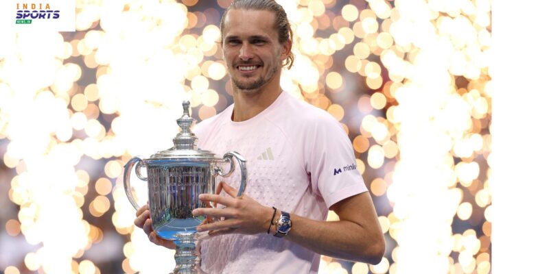 Alexander Zverev holds the 2026 US Open trophy after winning the men’s singles final.
